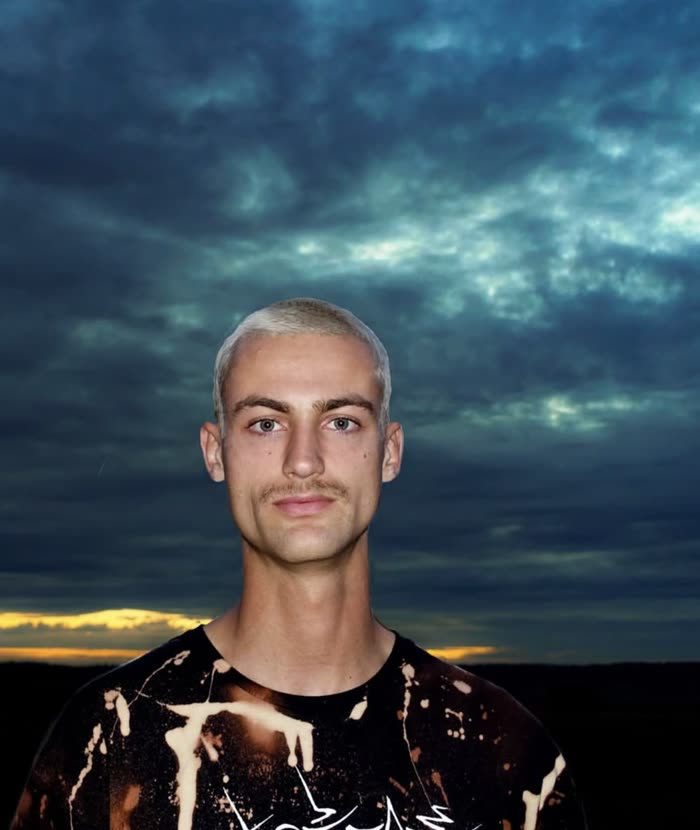 Oneiroi, portrait against a dark blue evening sky
